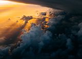 Sunset seen through clouds from above