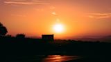 Decorative image of a sunset for an article