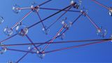 Decorative image of rods connecting transparent nodes for article