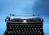 Typewriter blue background