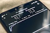 Mobile phone running an internet speed test