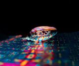 Decorative image of colourful lightbulb for article