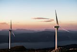 Decorative image of wind turbines for article