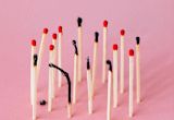Decorative image of matches with some burnt out for article