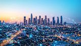 A vibrant cityscape at dawn