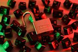 Decorative image of padlock on computer keys for article