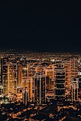 Decorative image of cityscape at night for article