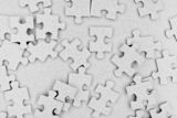 white puzzle pieces disconnected