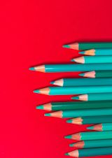 Pencils on Red Background