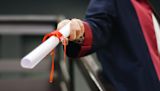 Decorative image of a person holding a degree for an article