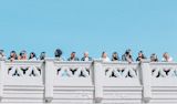Decorative image of women on a balcony for article