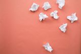 Decorative image of scrunched up paper balls on a plain coloured background for An introduction to policymaking lesson 6.1