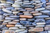 Decorative image of pebble wall for article
