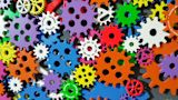 Decorative image of colourful cogs for article