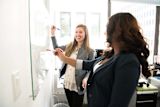 five-low-cost-high-impact-innovations-any-agency-can-adopt_asset_board-discussing-employees-1181533-1