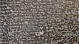 Decorative image of maths equations on chalkboard for article