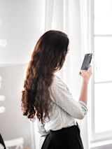 gender-equality-women-phone-call_asset_laura-chouette-osumdqykcro-unsplash