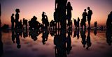 Decorative image of group of people walking in the sunset for article