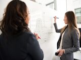 gender-smart-investing-unlock-trillions_asset_board-colleagues-discussing-1181530-1
