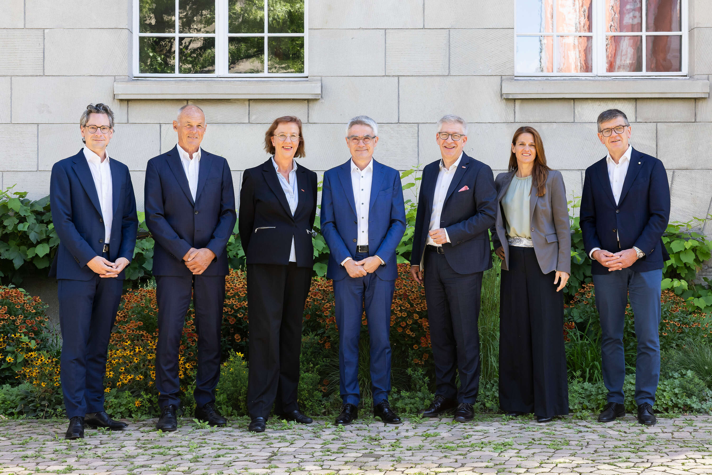 The Board of Directors of the Rhaetian Railway in front of the administration building in Chur.