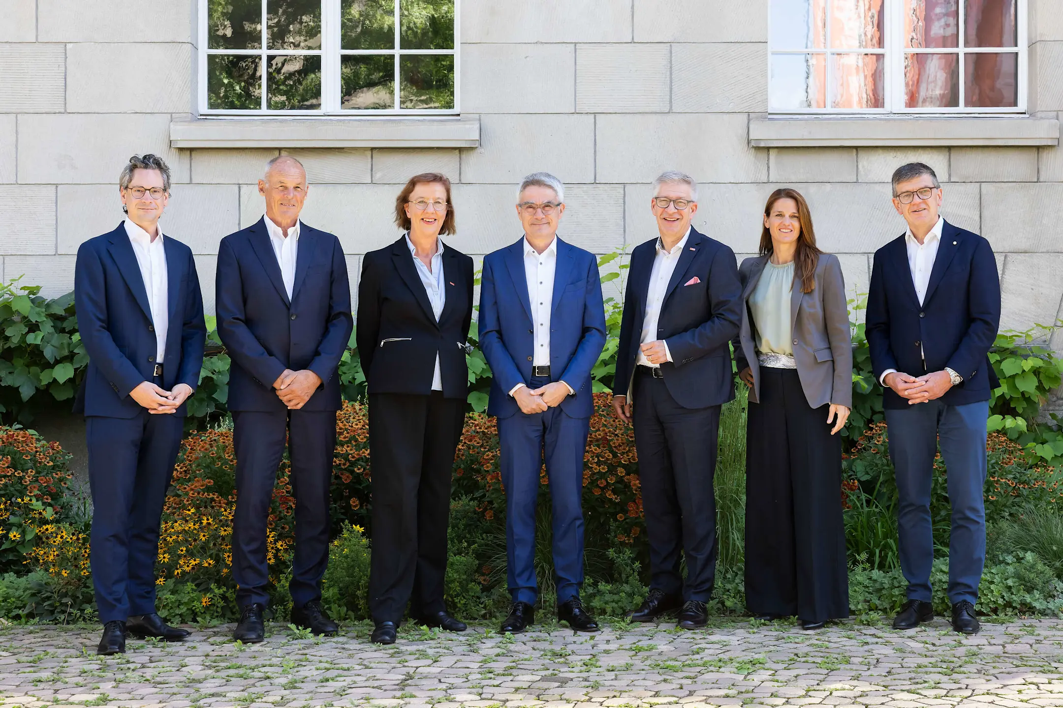 The Board of Directors of the Rhaetian Railway in front of the administration building in Chur.