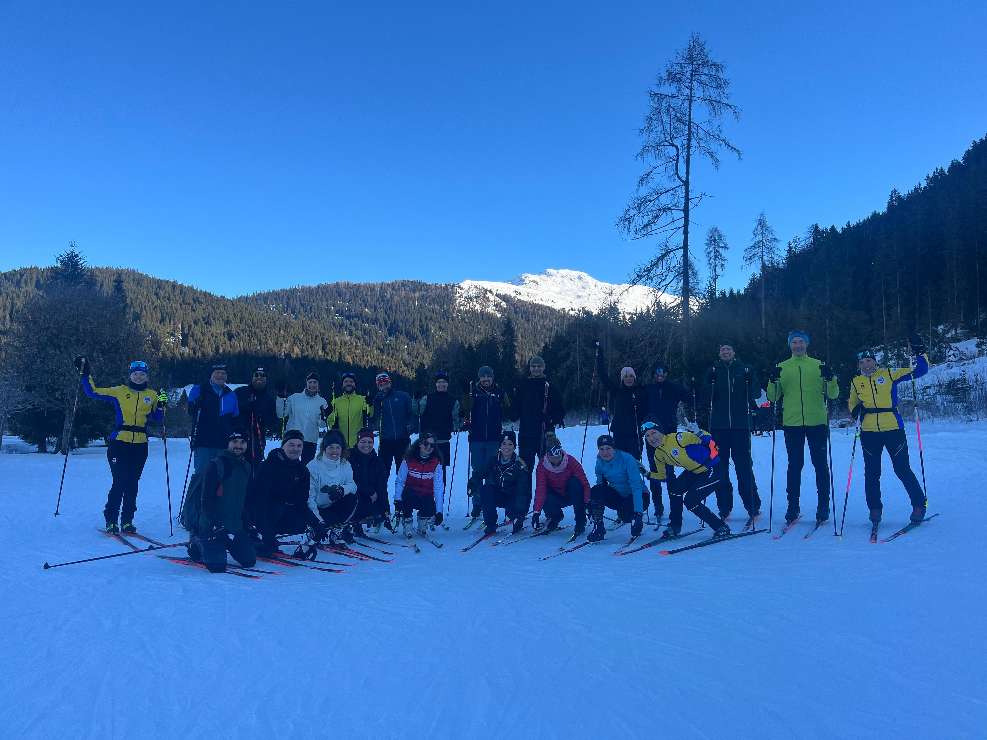 A group of cross-country skiers in Davos in the snow
