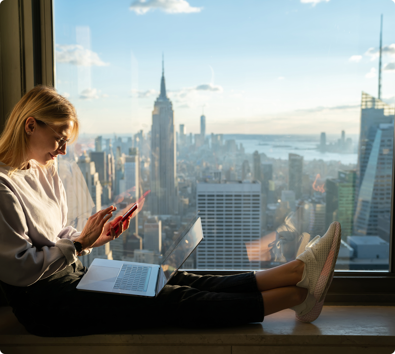 Sitting-in-skyscraper-window
