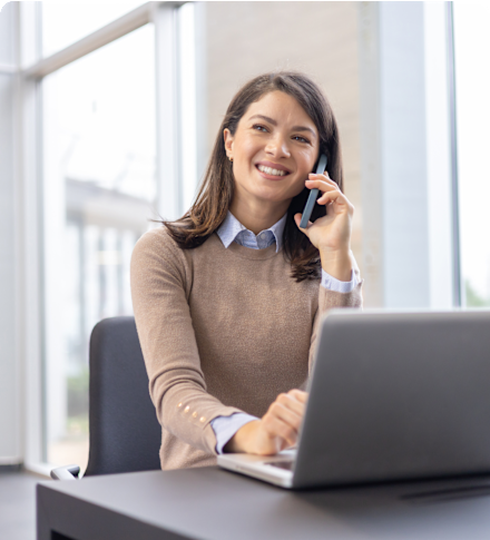 woman sitting at desk cropped