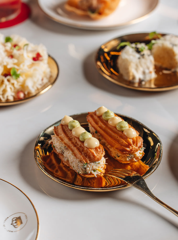 Gourmet sandwiches on a golden plate