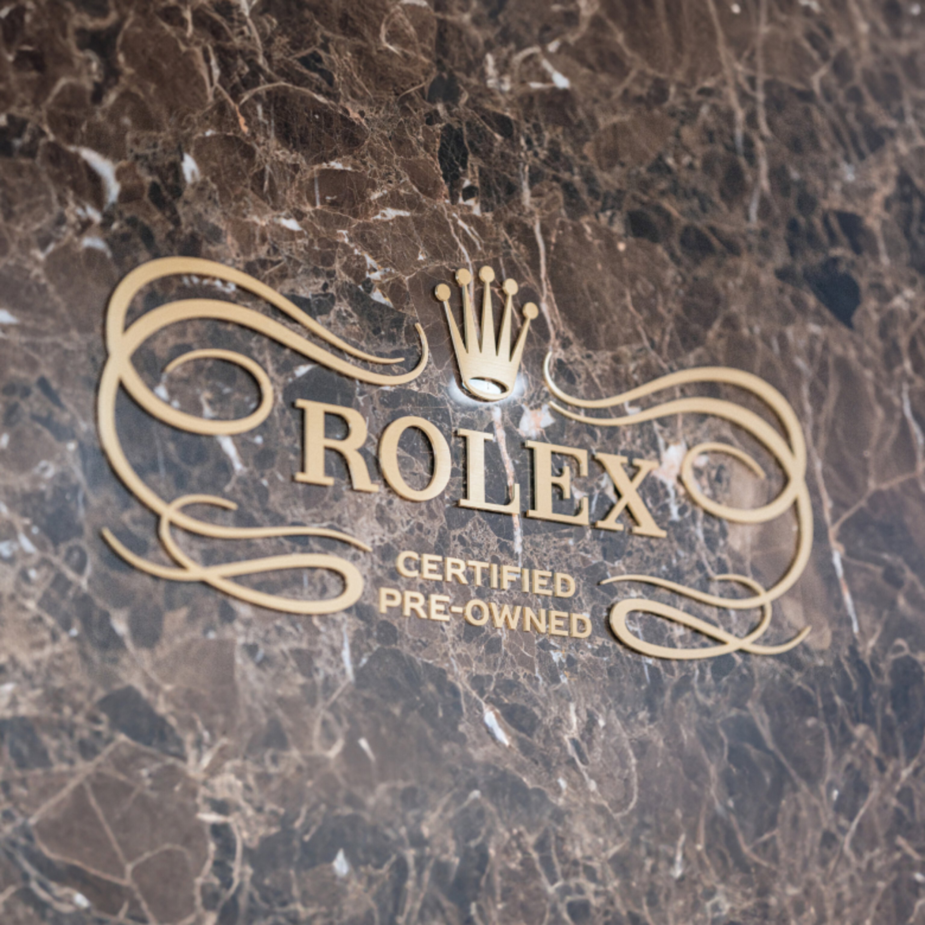 Rolex Certified Pre-Owned logo