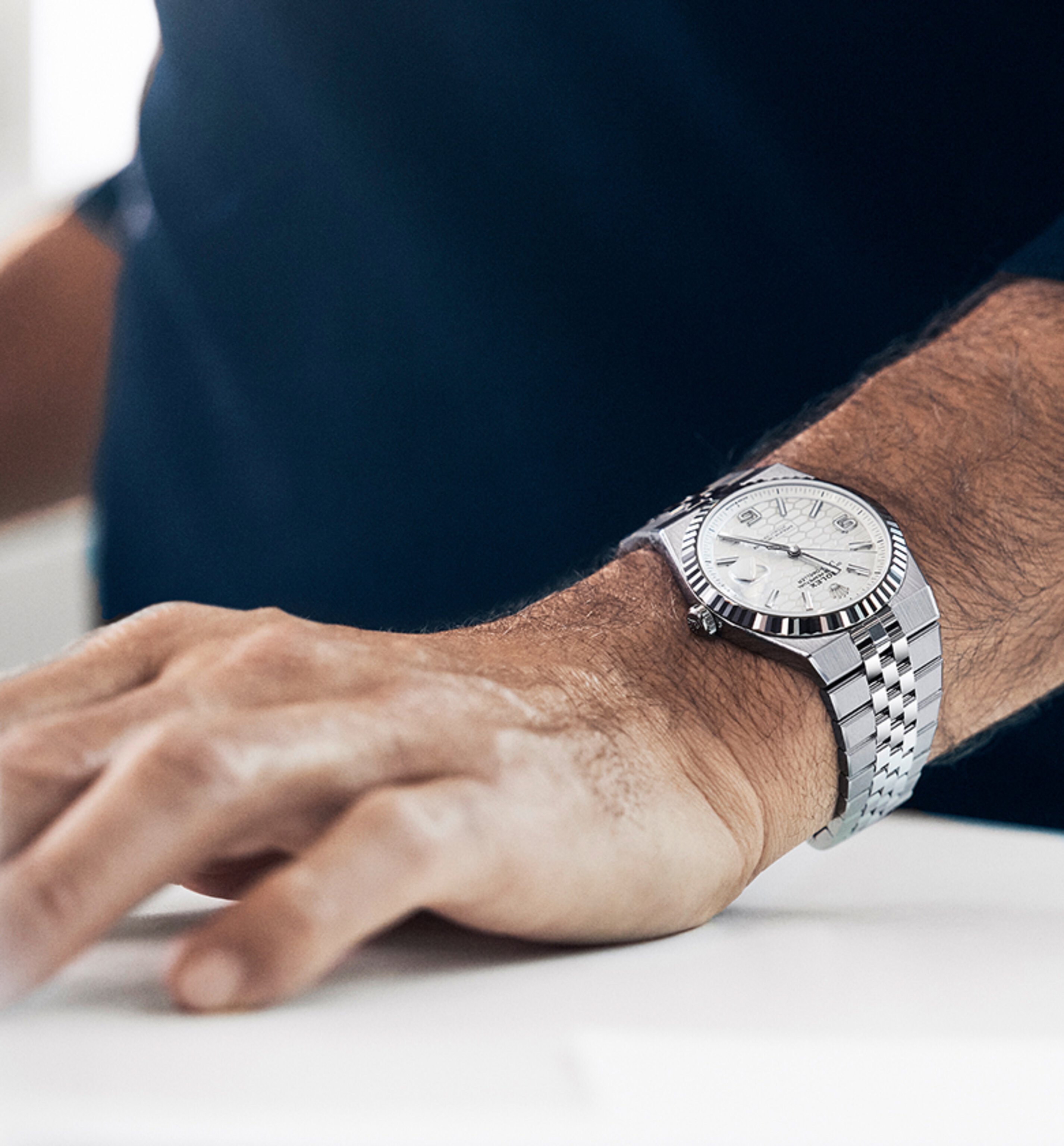 Man wearing a Rolex Land-Dweller watch