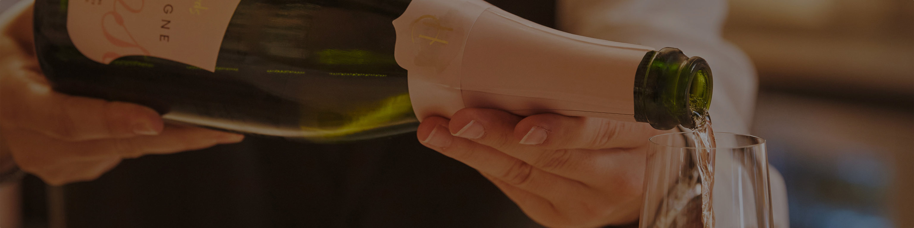 Waiter pouring a glass of champagne