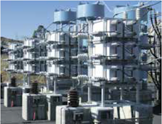 Capacitor banks in a high-voltage substation for power compensation and grid stabilization.