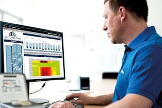 Employee analyzes energy data on a computer screen with GridVis software