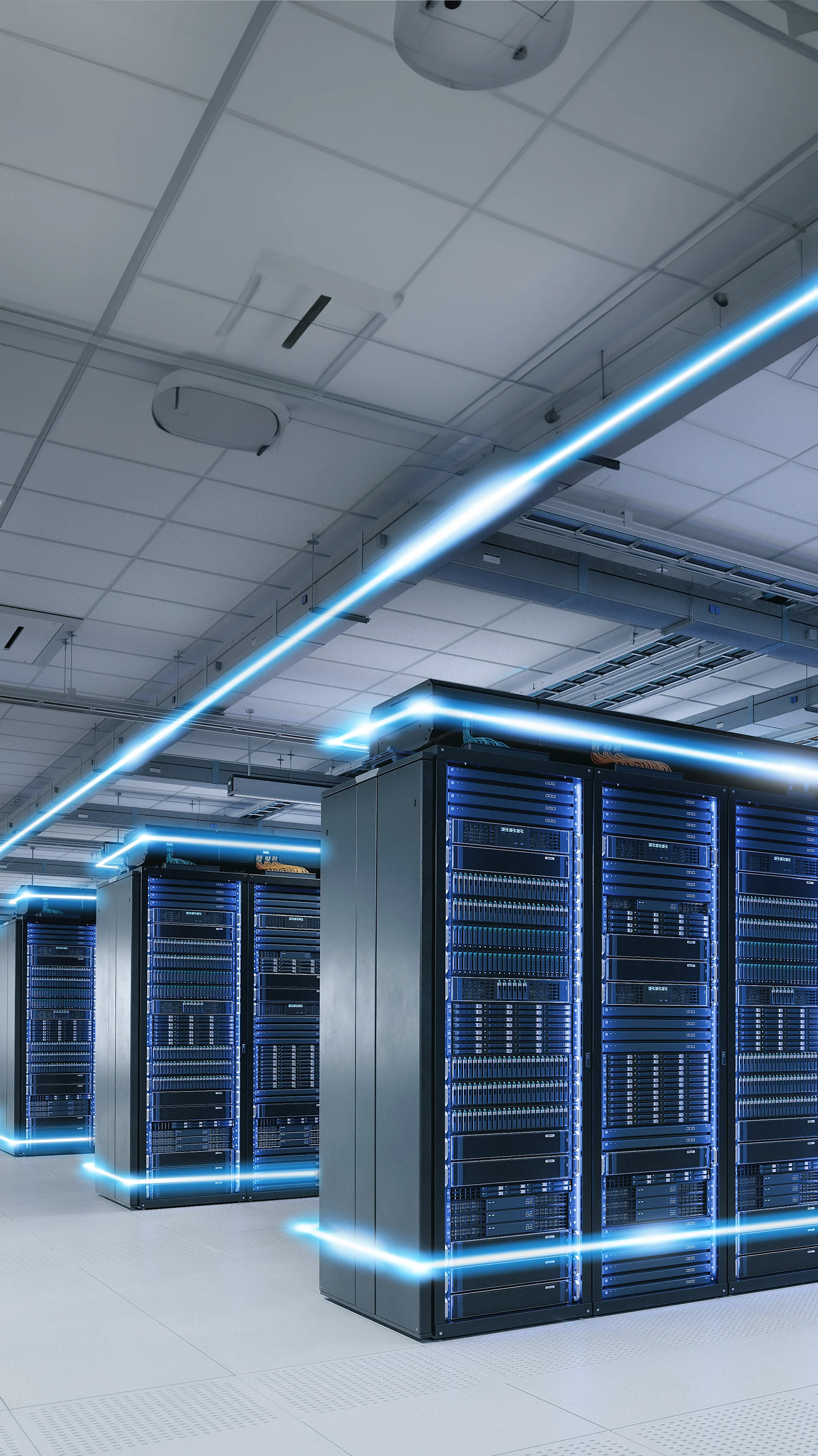 Modern data center with illuminated servers for data storage and processing.