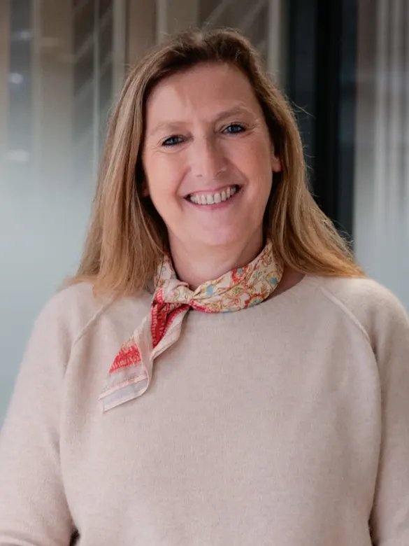 Marine Puech smiles at the camera.