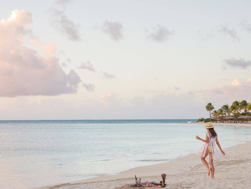 JBI - Woman walking on the beach