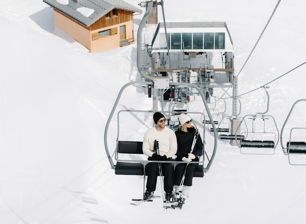APG - Couple on chair lift