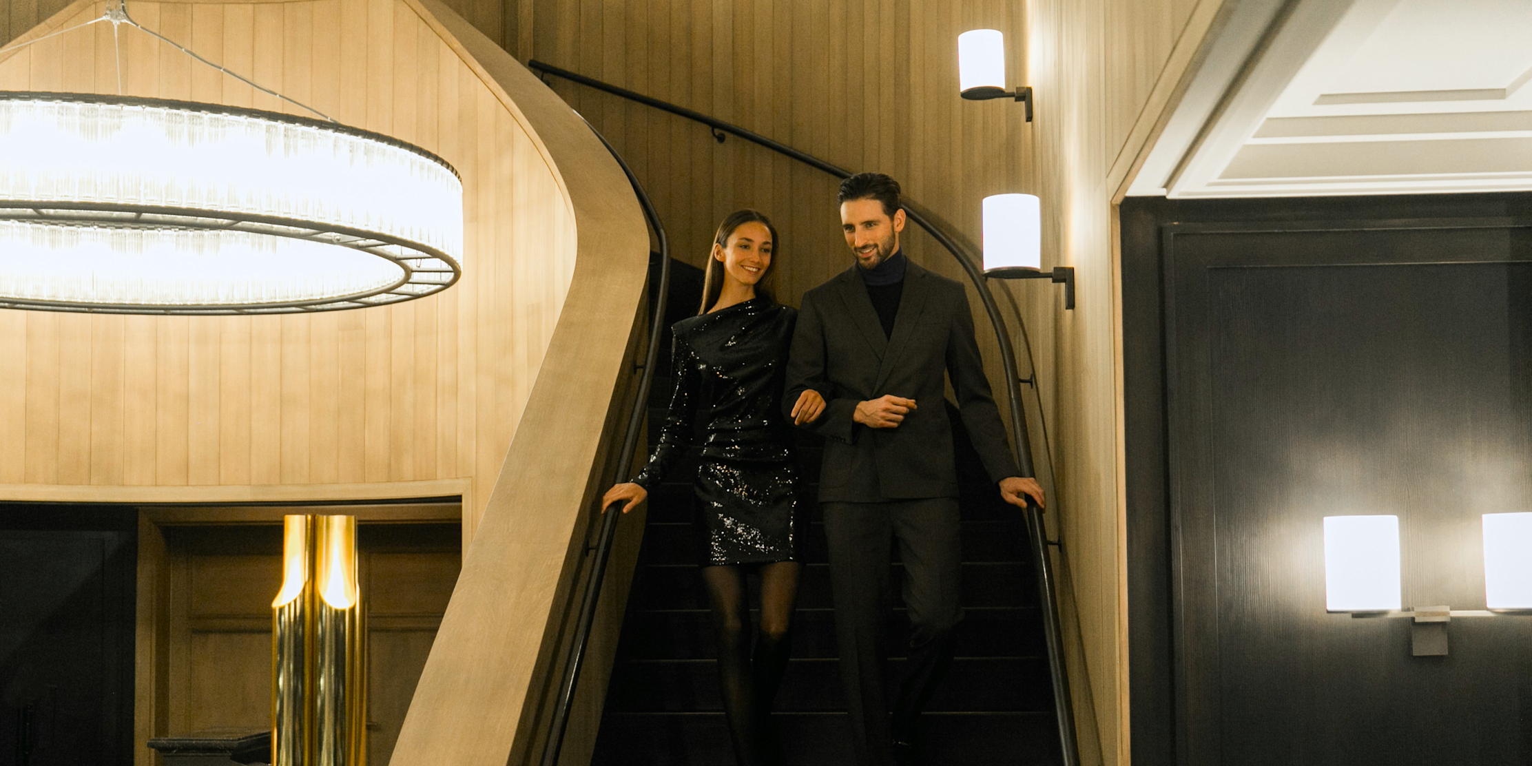 APG - Couple walking down the stairs