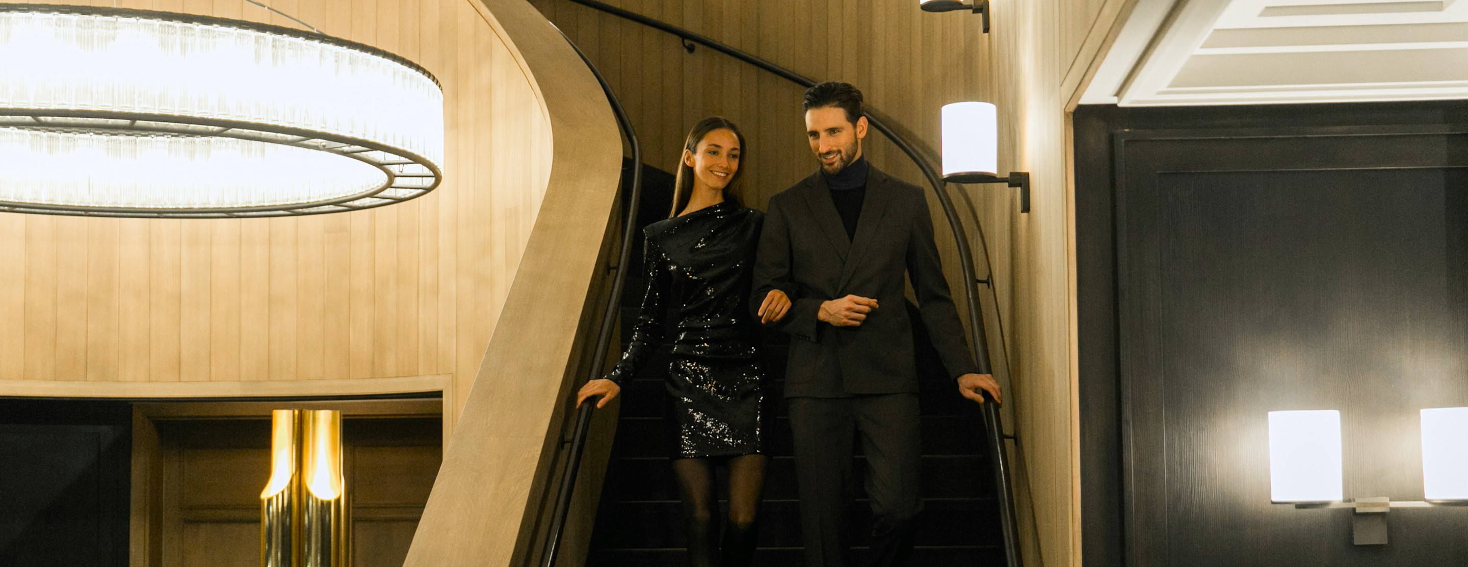 APG - Couple walking down the stairs