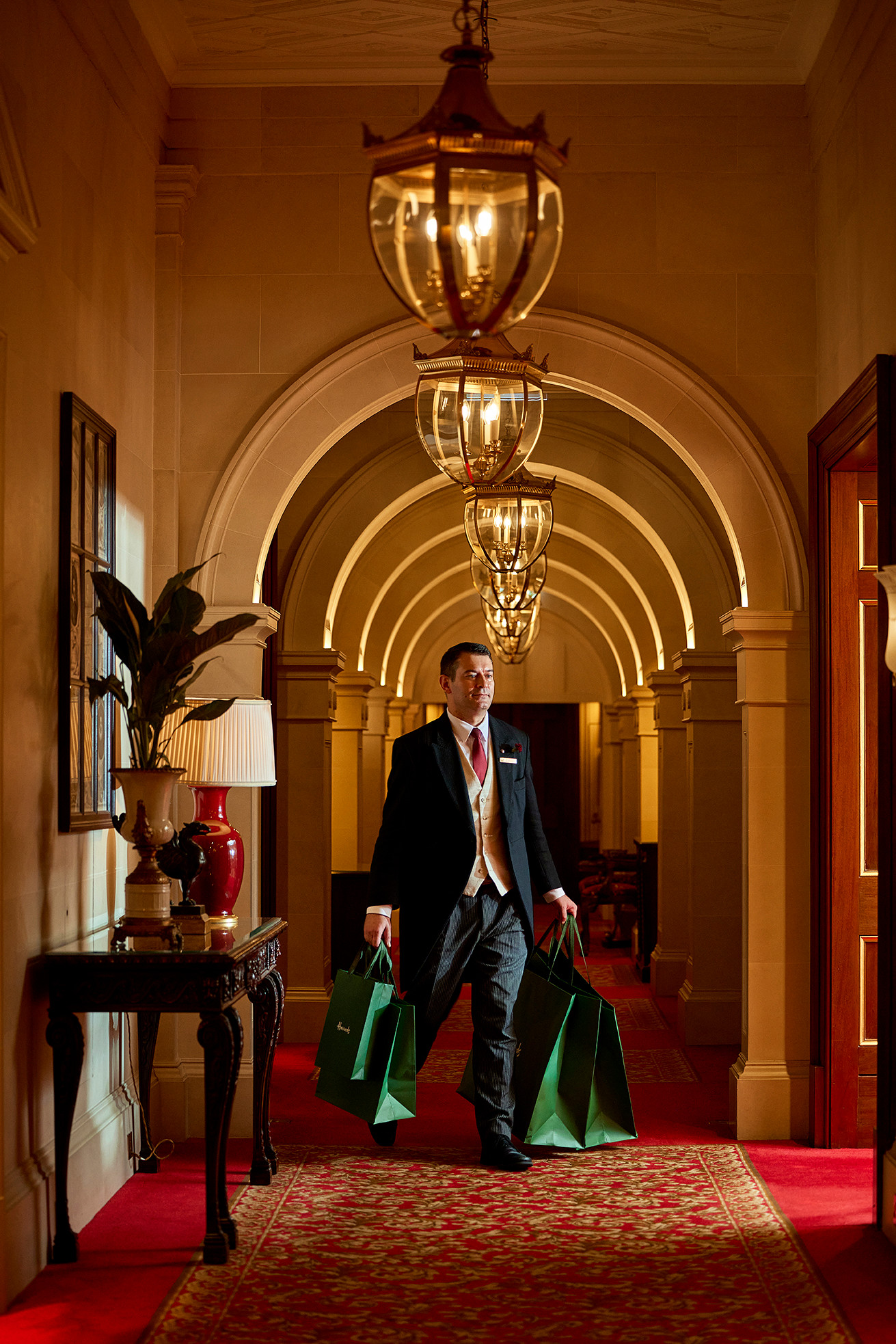 The Lanesborough Butler with Harrods Bags 