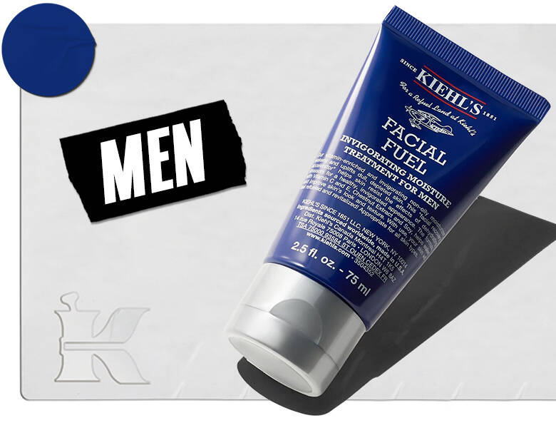 Her ses en lysegrå baggrund med et blåt produkt i højre side. I venstre ses et sort skilt med "men" i hvid. 