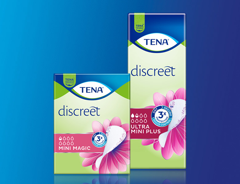 To pakker TENA Discreet vises på blå baggrund – Mini Magic og Ultra Mini Plus.