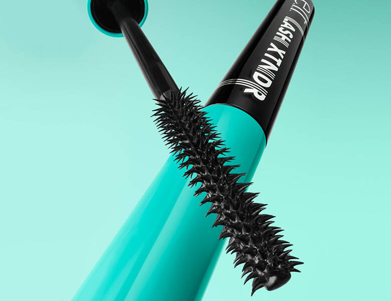 Her ses en mintgrøn baggrund med en elf mascara.