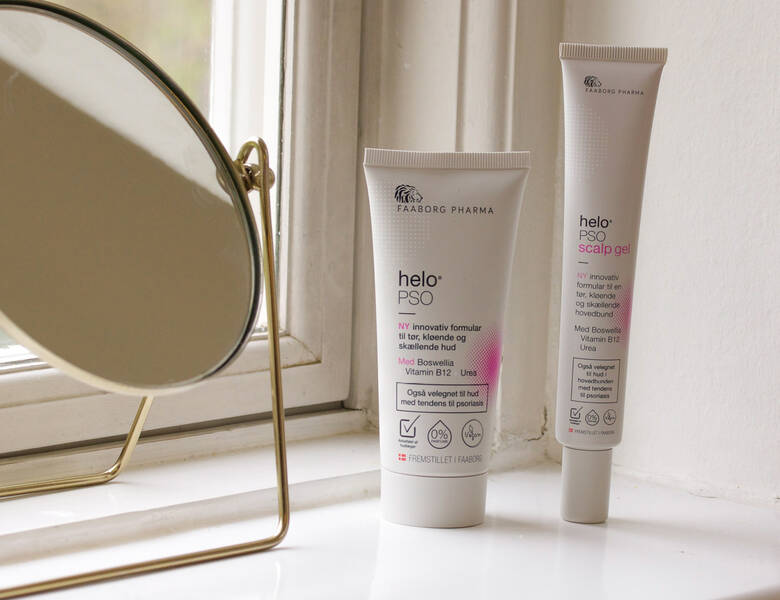 Her ses to Faaborg Pharma produkter og et spejl i en vinduskarm. 