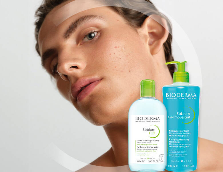 Her ses en mands ansigt med to BIODERMA produkter foran sig.