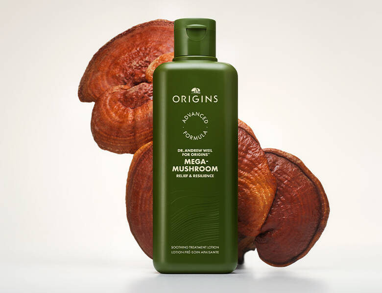 Her ses en hvid baggrund med et grønt produkt, som har noget rødt bag sig. 