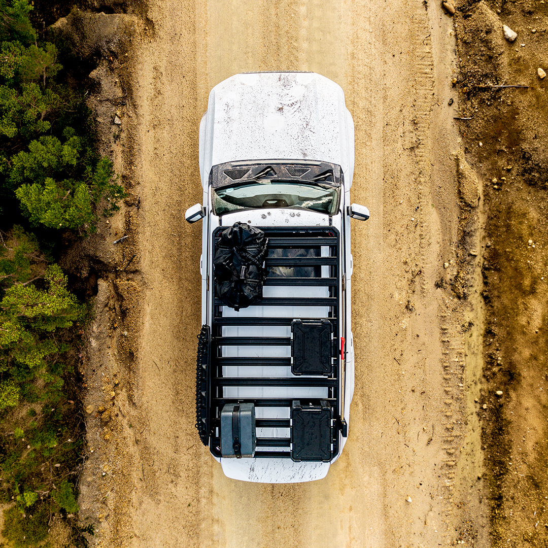 Overhead view of white SUV with rack
