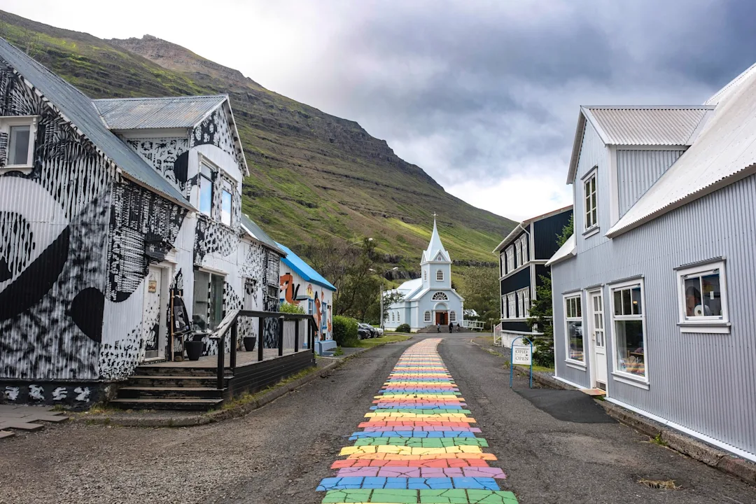 The rainbow street of Seyðisfjörður, Iceland. Credit: Tommy Simonsen