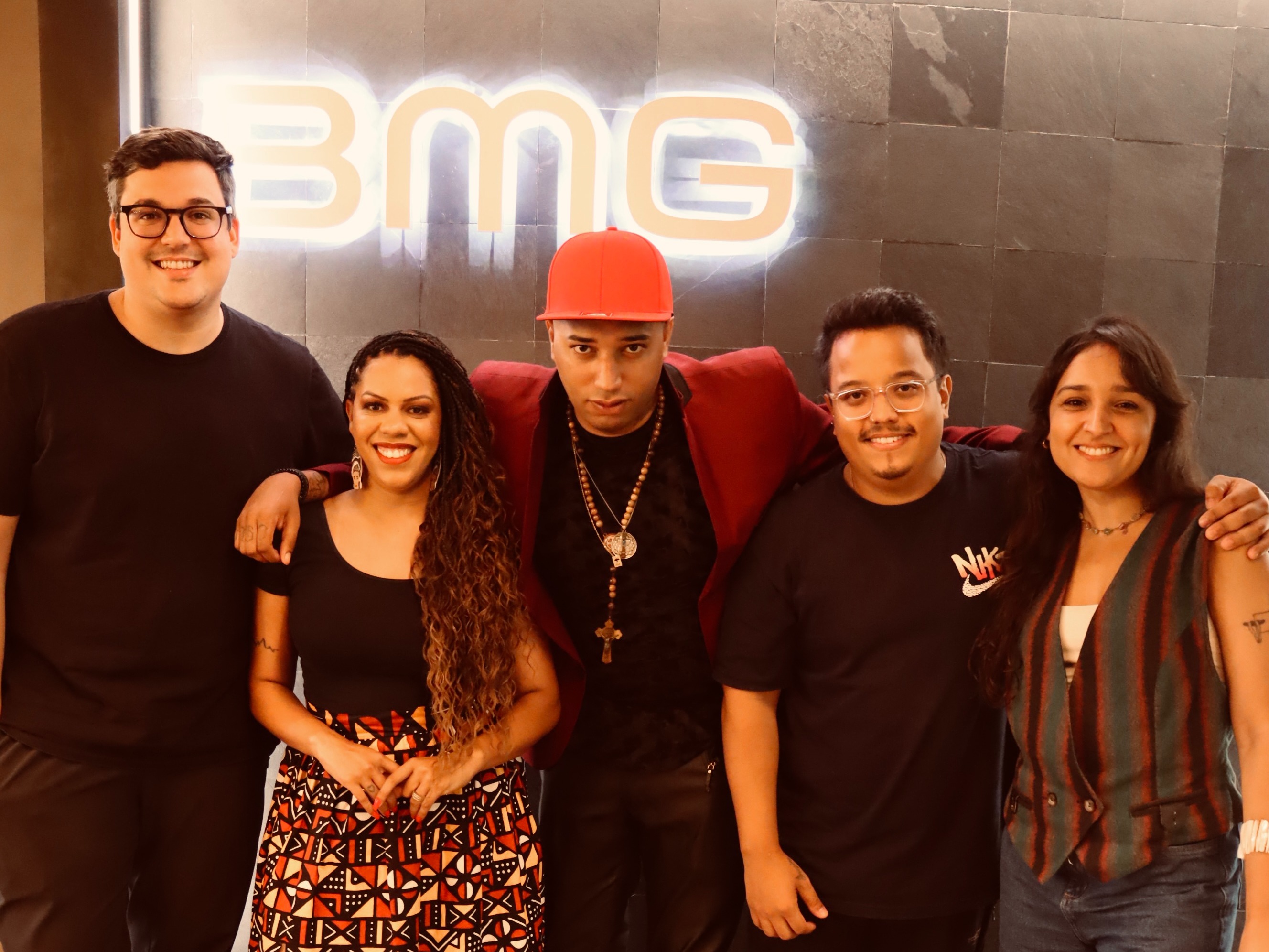 L to R: Daniel Fernandes (BMG General Manager Brazil), Tamires Mateus (Sabotage's daughter), Sabotinha (Sabotage's son), Lan Santos (BMG A&R), Jullie Steffanine (BMG A&R). (c) BMG